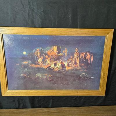 Framed print Laugh Kills Lonesome by artist Charles Marion Russell. with two other pieces of artwork