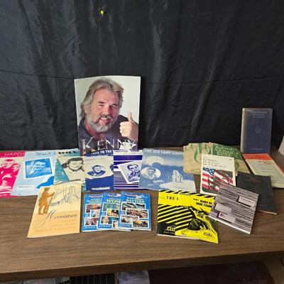 Super stamp collection booklets, Kenny Rogers pamphlet, Small historical booklets, books, and some sheets of music