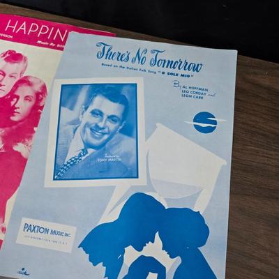 Super stamp collection booklets, Kenny Rogers pamphlet, Small historical booklets, books, and some sheets of music