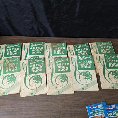 Super stamp collection booklets, Kenny Rogers pamphlet, Small historical booklets, books, and some sheets of music