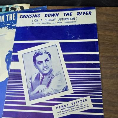 Super stamp collection booklets, Kenny Rogers pamphlet, Small historical booklets, books, and some sheets of music