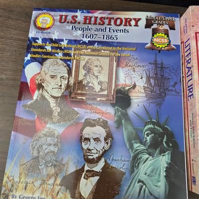 Collection of teacher guides, History, Books with more than 1 copy, posters, and other things teachers can use