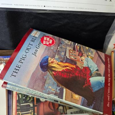 Collection of teacher guides, History, Books with more than 1 copy, posters, and other things teachers can use