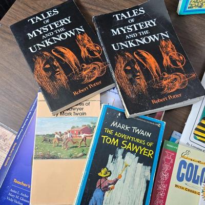 Collection of teacher guides, History, Books with more than 1 copy, posters, and other things teachers can use