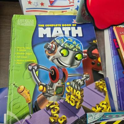 Collection of teacher guides, History, Books with more than 1 copy, posters, and other things teachers can use