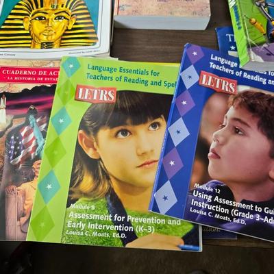 Collection of teacher guides, History, Books with more than 1 copy, posters, and other things teachers can use