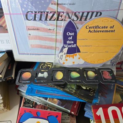 Collection of teacher guides, History, Books with more than 1 copy, posters, and other things teachers can use