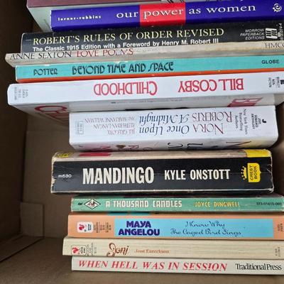 Boxes of softback books of different genres - Anne Frank - and more