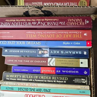 Boxes of softback books of different genres - Anne Frank - and more