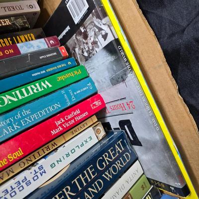 Boxes of softback books of different genres - Anne Frank - and more