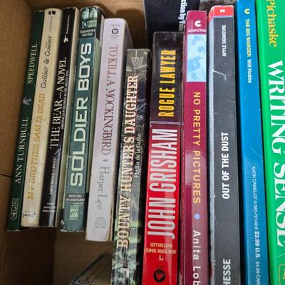 Boxes of softback books of different genres - Anne Frank - and more