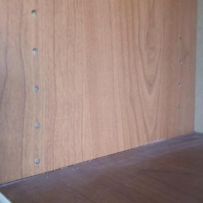 Tall wood bookshelf with adjustable shelves