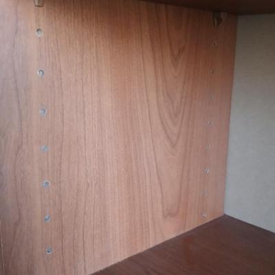 Tall wood bookshelf with adjustable shelves