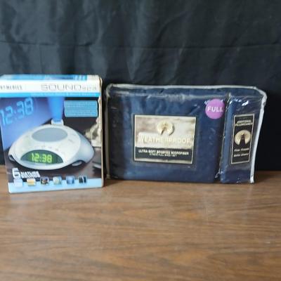 Brand new Homedics sound spa alarm clock with projectable time - and a new Full size 6-piece sheet set