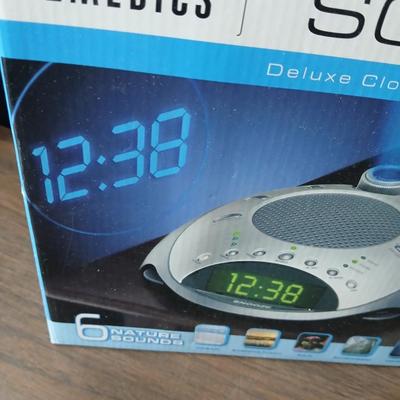 Brand new Homedics sound spa alarm clock with projectable time - and a new Full size 6-piece sheet set