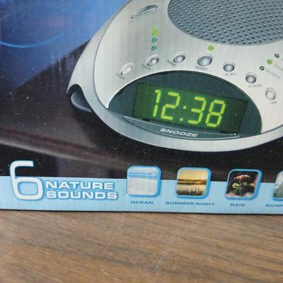 Brand new Homedics sound spa alarm clock with projectable time - and a new Full size 6-piece sheet set