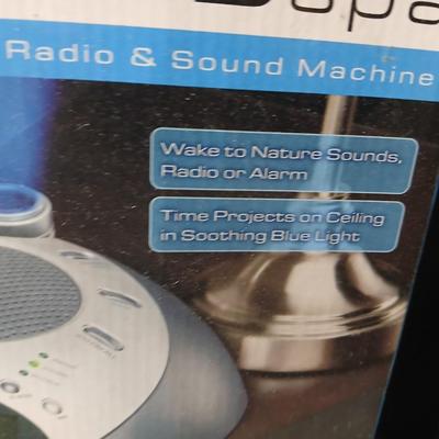 Brand new Homedics sound spa alarm clock with projectable time - and a new Full size 6-piece sheet set