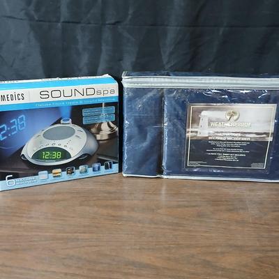 Brand new Homedics sound spa alarm clock with projectable time - and a new Full size 6-piece sheet set