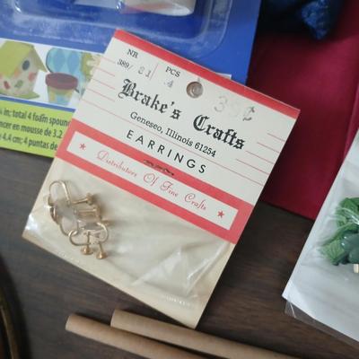 Crafting supplies - Faux greenery - small wooden baskets - Beautiful Quilt that needs finished - fabric and more