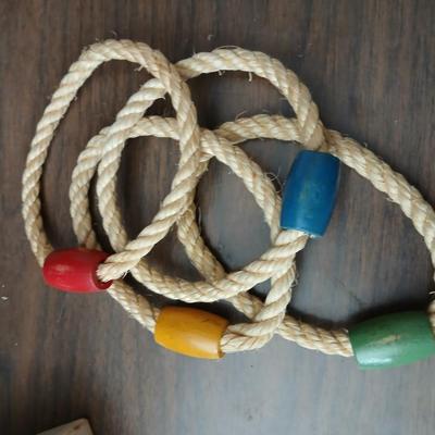 Collection of vintage toys - miniature wood bowling pins - Childs horseshoe game- Ring toss & dominoe sets