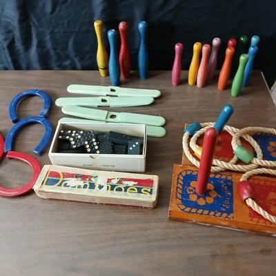 Collection of vintage toys - miniature wood bowling pins - Childs horseshoe game- Ring toss & dominoe sets
