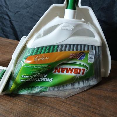 Brand new Libman sponge mop with new libman broom and dust pan and a flipflop fly swatter