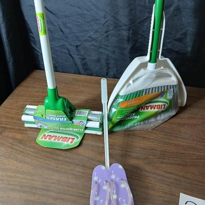 Brand new Libman sponge mop with new libman broom and dust pan and a flipflop fly swatter