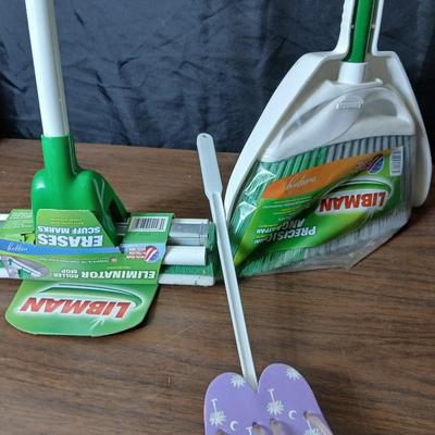 Brand new Libman sponge mop with new libman broom and dust pan and a flipflop fly swatter