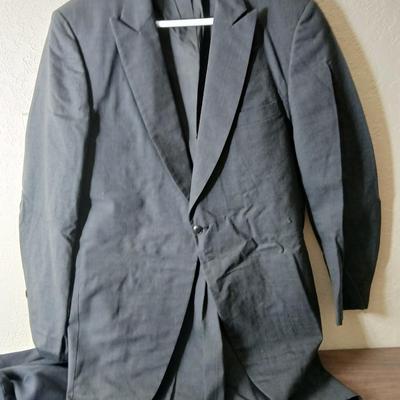 Variety of suit coats that appear to have been altered in the front
