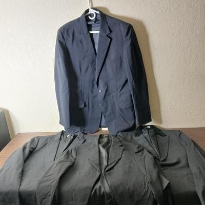 Variety of suit coats that appear to have been altered in the front