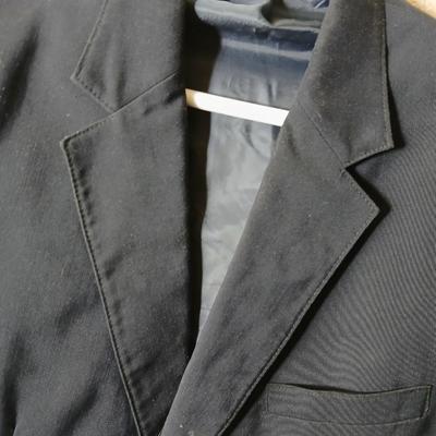 Variety of suit coats that appear to have been altered in the front