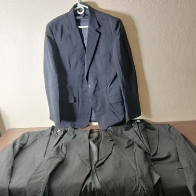 Variety of suit coats that appear to have been altered in the front