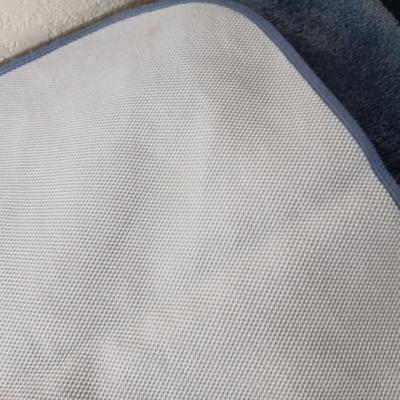 Assortment of curtains and throw rugs