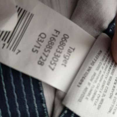 Assortment of curtains and throw rugs