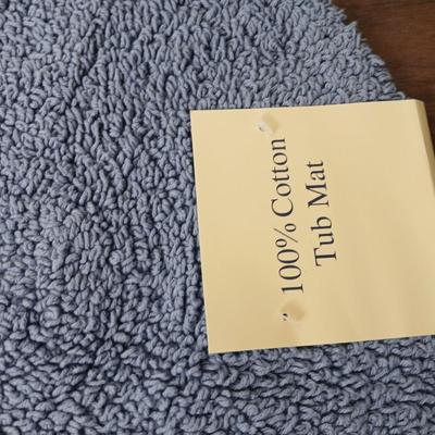 Assortment of curtains and throw rugs