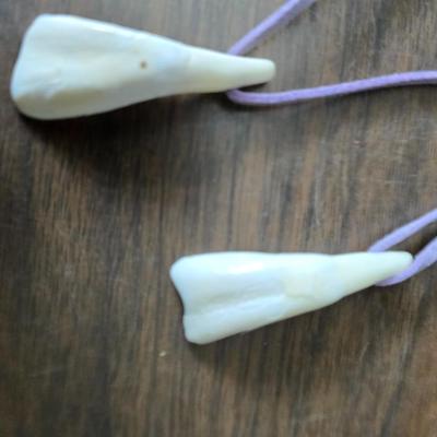 Assortment of collectibles - vintage guitar strings - vintage lighter - trinket boxes - vintage vase - brand new smart bracelet and more