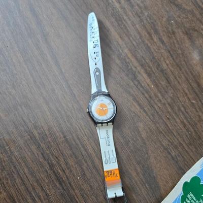 Assortment of collectibles - vintage guitar strings - vintage lighter - trinket boxes - vintage vase - brand new smart bracelet and more