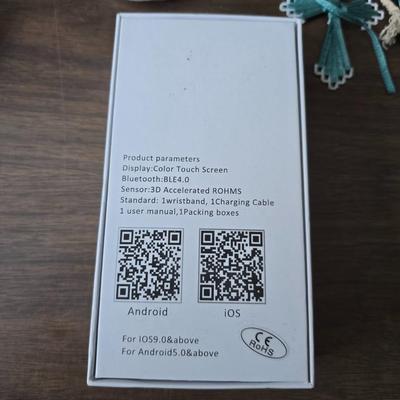 Assortment of collectibles - vintage guitar strings - vintage lighter - trinket boxes - vintage vase - brand new smart bracelet and more