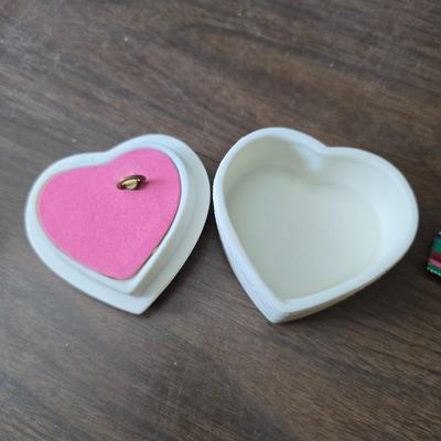 Assortment of collectibles - vintage guitar strings - vintage lighter - trinket boxes - vintage vase - brand new smart bracelet and more