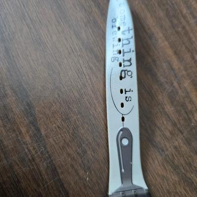 Assortment of collectibles - vintage guitar strings - vintage lighter - trinket boxes - vintage vase - brand new smart bracelet and more