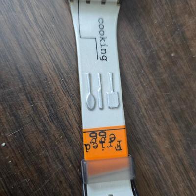 Assortment of collectibles - vintage guitar strings - vintage lighter - trinket boxes - vintage vase - brand new smart bracelet and more