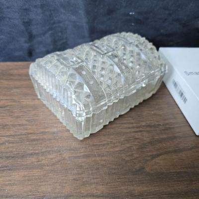 Assortment of collectibles - vintage guitar strings - vintage lighter - trinket boxes - vintage vase - brand new smart bracelet and more