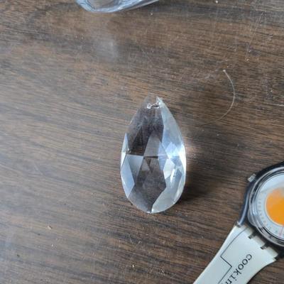 Assortment of collectibles - vintage guitar strings - vintage lighter - trinket boxes - vintage vase - brand new smart bracelet and more