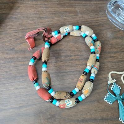 Assortment of collectibles - vintage guitar strings - vintage lighter - trinket boxes - vintage vase - brand new smart bracelet and more