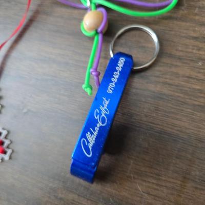 Large brass key - key hanger and a selection of keychains