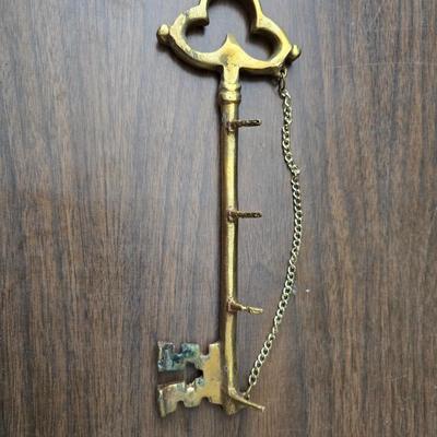 Large brass key - key hanger and a selection of keychains