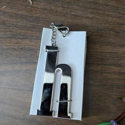 Large brass key - key hanger and a selection of keychains