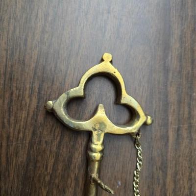 Large brass key - key hanger and a selection of keychains