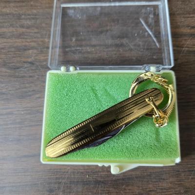 Large brass key - key hanger and a selection of keychains