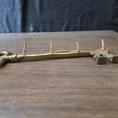 Large brass key - key hanger and a selection of keychains